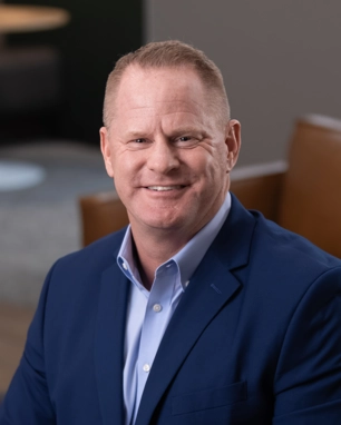 smiling person in professional attire
